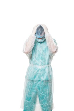 Cerrah portre. elleri ile kapalı yüz. üzücü. Beyaz arka plan üzerinde izole