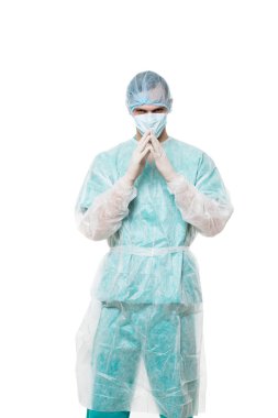 Surgeon portrait. isolated on white background. focuses on reflection. fingers pyramid. praying