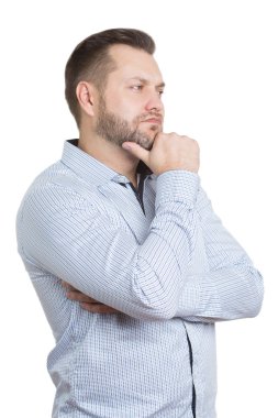 adult male with a beard. isolated on white background. Body language. non-verbal cues. training managers. touch to face. finger under his chin.