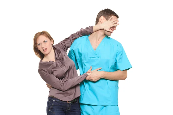 Girl sees a doctor. the struggle of the patient to the doctor. sexual harassment. Isolated — Stock Photo, Image