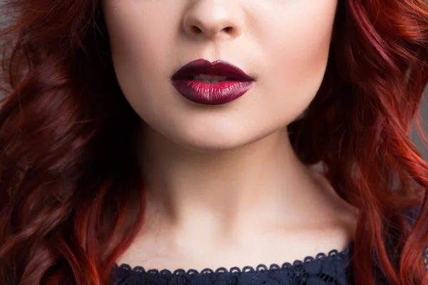 Closeup cherry lips. girl with red hair. the lower part of the face. Fashion Girl Portrait. — Stok fotoğraf