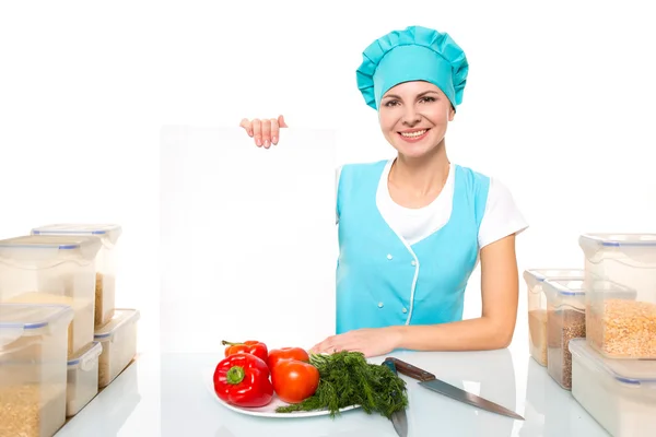 Attractive girl chef with a white plate. Isolated. vvery happy — 스톡 사진