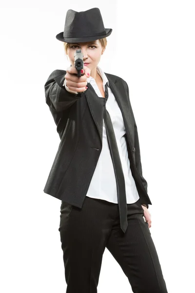 Hermosa chica gangster sosteniendo un arma. Traje clásico y sombrero. aislado en blanco —  Fotos de Stock