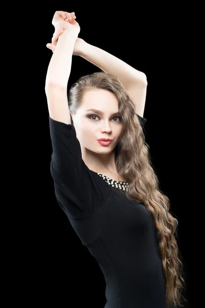 Portrait of beautiful brunette woman in black dress. — Stock Photo, Image