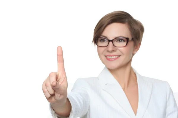 Young attractive businesswoman pressing the touchscreen button. Isolated on white. — Stock Photo, Image