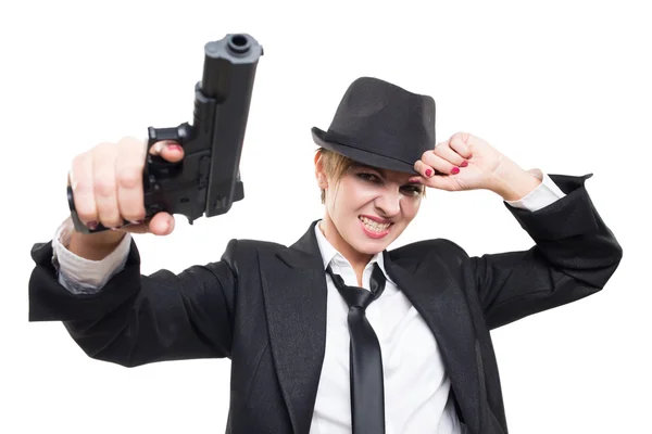 Beautiful girl gangster holding a gun. Classic suit and hat. isolated on white — Stock Photo, Image