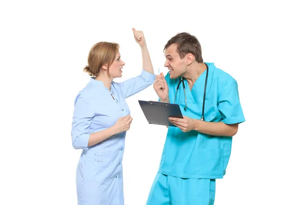 Isolated on white. doctor swears nurse. He screams and beats him — Stock Photo, Image