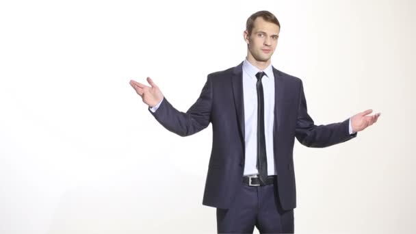 Man in business suit isolated on white background. open posture.  open palms. gesture of goodwill and loyalty. Training managers. sales agents. — Stock Video