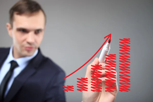Businessman highlighting business growth on a graph. profit — Stock Photo, Image