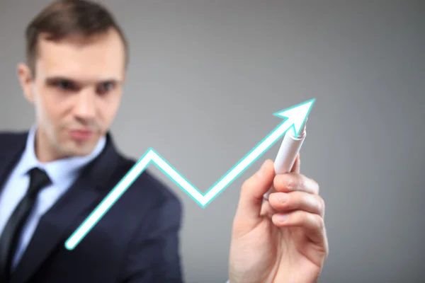 Businessman highlighting business growth on a graph. profit — Stock Photo, Image