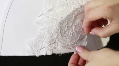 Korse bağlama imalat bitki iç çamaşırı. İç çamaşırı, dantel korse terzi bağlama imalatı. Beyaz korse