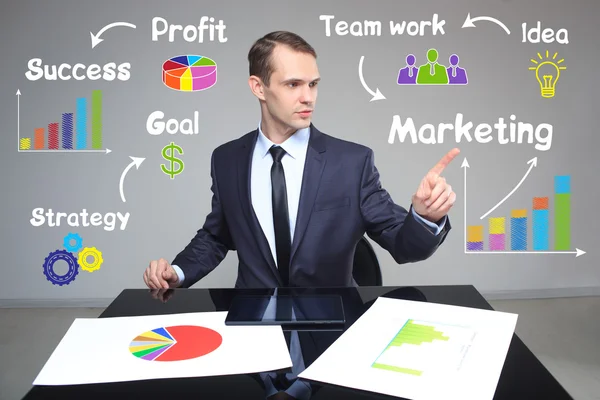 Businessman showing growth rates in the chart. Business concept. — Stock Photo, Image