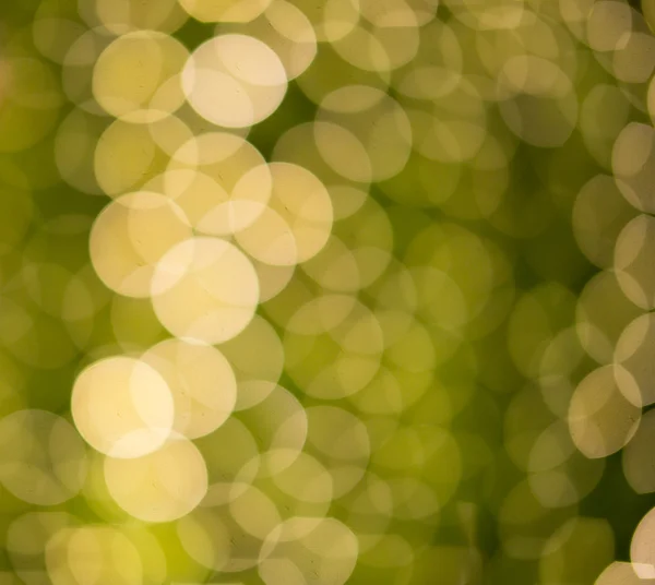 Sarı ve turuncu bir tatil şenlikli bokeh. Noel arka plan