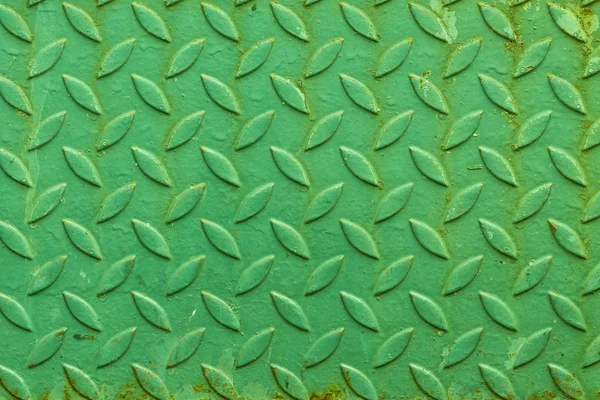 Desen veya arka plan veya doku eski bir yeşil paslı çelik