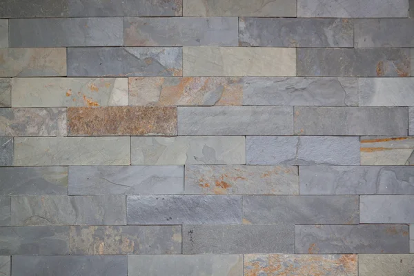 Arka plan ve doku için eski dikdörtgen taş duvar