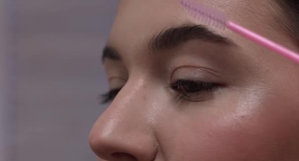Jest Materiał Filmowy Cudownym Nagraniem Młodej Dziewczyny Robiącej Makijaż Ten — Wideo stockowe