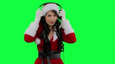 Kulaklıklar koyarak Santa yardımcı kız