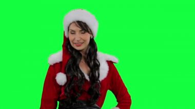 Santa yardımcı kız bir hava öpücük gönderir