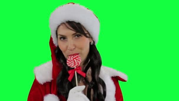 Santa helper meisje met Kerstmis snoep — Stockvideo