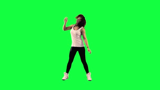 Bailarina sobre un fondo verde — Vídeo de stock