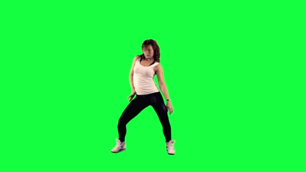 Bailarina sobre un fondo verde — Vídeos de Stock