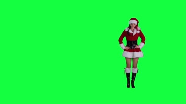 Sexy Santa's helper demonstrates an object chroma key (green screen) — Stock Video