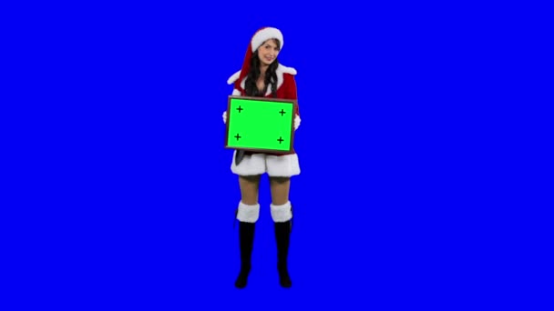 Sexy Santa 's helper demonstrates frame for tracking chroma key (green screen ) — стоковое видео