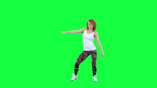 Dancing woman isolated on green — Stock Video