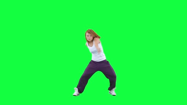 Dancing woman isolated on green — Stock Video