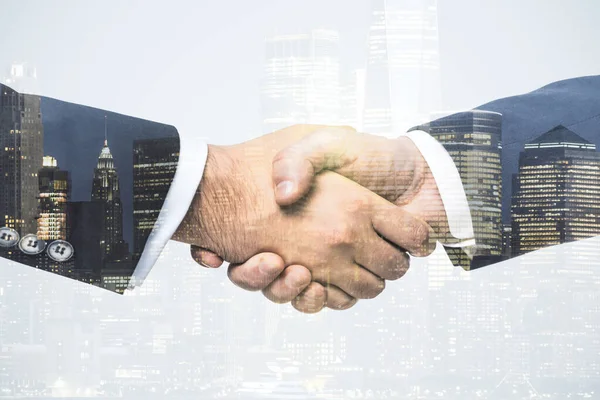 Handshake of two businessmen on modern cityscape background, deal and trading concept. Multiexposure — Stock Photo, Image