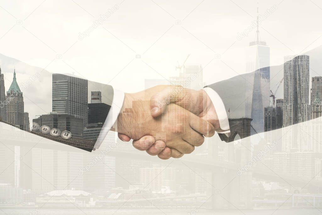 Double exposure of handshake two businessmen on modern skyscrapers background, research and strategy concept