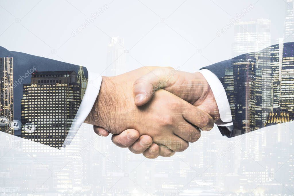 Double exposure handshake of two businessmen on office buildings background, collaboration and cooperation concept