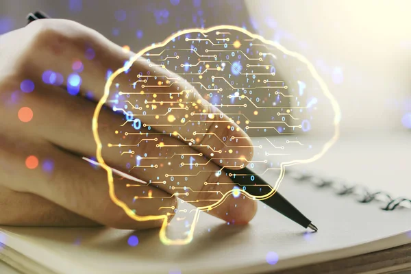 背景にノートブックに手書きで人間の手で創造的な人工知能シンボルの二重露出。ニューラルネットワークと機械学習の概念 — ストック写真