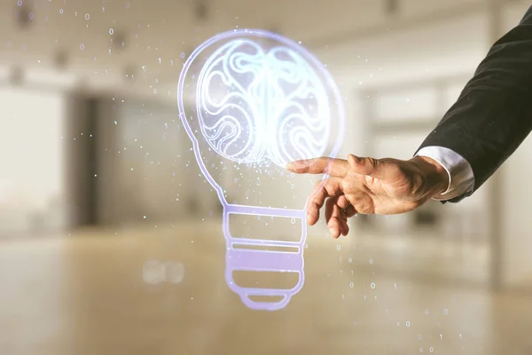 Dubbel exponering av manliga handpressar på abstrakt virtuell kreativ glödlampa hologram med mänsklig hjärna på suddig kontor bakgrund, idé och brainstorming koncept — Stockfoto