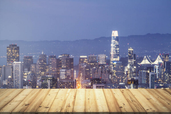 Table top made of wooden dies with San Francisco city view at dusk on background, template