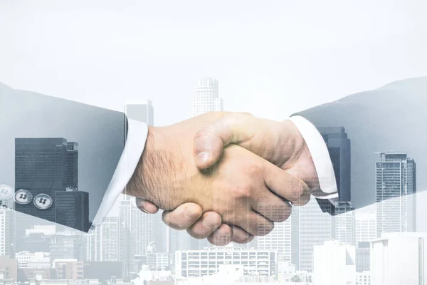 Handshake of two businessmen on modern city skyline background, deal and partnership concept. Multiexposure — Stock Photo, Image