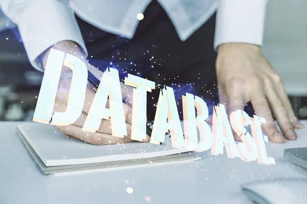 Double exposure of Database word sign with hand writing in diary on background with laptop, global research and analytics concept — Stock Photo, Image