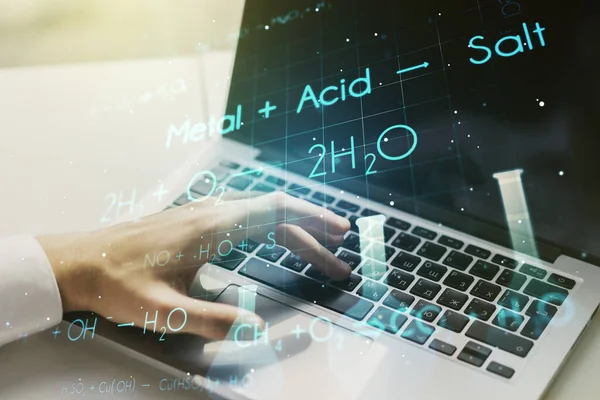 Creative chemistry hologram with hands typing on computer keyboard on background, pharmaceutical research concept. Multiexposure