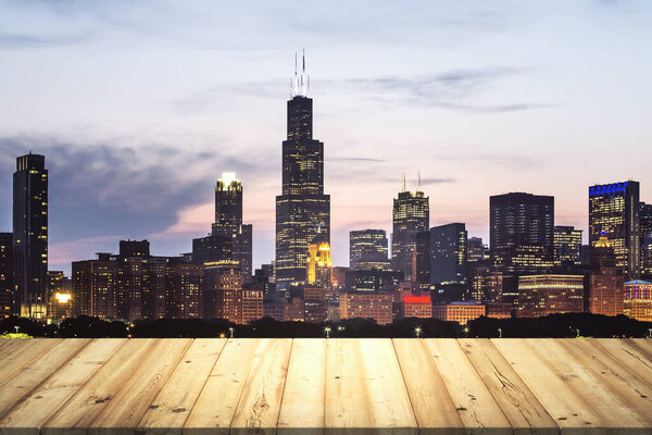 Table top made of wooden dies with beautiful Chicago cityscape at twilight on background, mockup