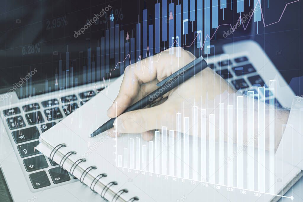 Multi exposure of abstract creative financial chart with hand writing in diary on background, research and analytics concept