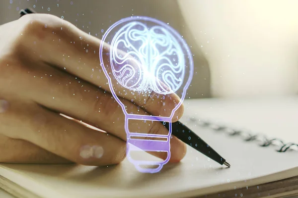 Creatieve gloeilamp illustratie met menselijk brein en met de hand schrijven in dagboek op de achtergrond, toekomstige technologie concept. Meervoudige blootstelling — Stockfoto