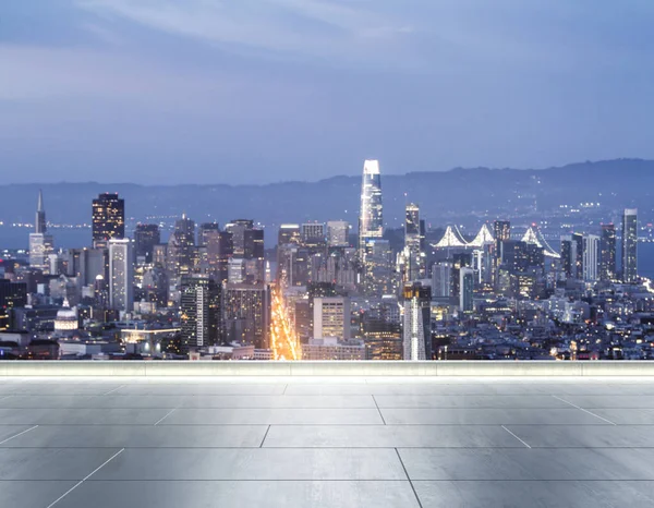 Empty concrete rooftop on the background of a beautiful blurry San Francisco city skyline at evening, mock up