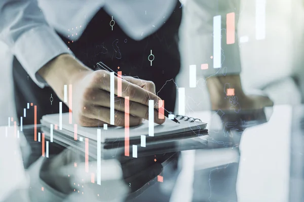 Double exposure of abstract creative financial chart with hand writing in notebook on background, research and strategy concept — Stock Photo, Image