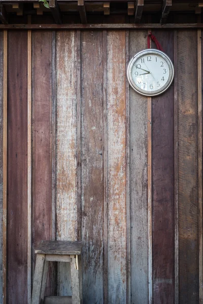 Old round clock hang on old wooden wall — Stock Photo, Image