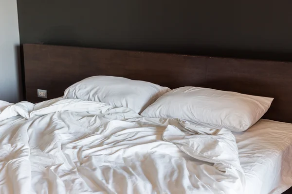 White bedding sheets and pillow, Messy bed concept