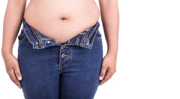 Mujer gorda tratando de usar jeans: concepto gordo y saludable —  Fotos de Stock