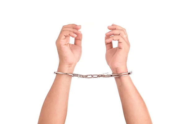 Крупним планом руки зі срібними наручниками ізольовані на білому — стокове фото