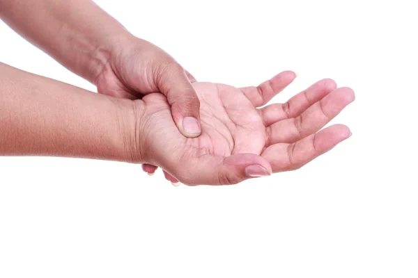 Närbild av kvinnans hålla hennes hand isolerade på vitt. Hand smärta c — Stockfoto