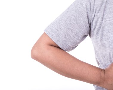 Beyaz izole onun dirseğini tutan kadının el kapatın. Dirsek