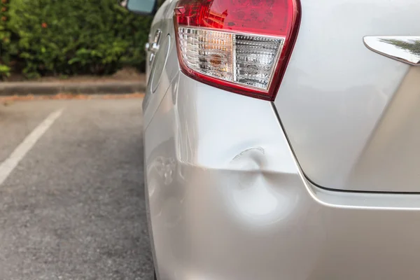 Backside of silver car get damaged by accident — Stock Photo, Image